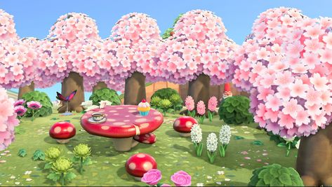 Cherry blossom trees arranged in a circle around a mushroom table and chairs with lots of flowers in a Fairycore style Acnh Fairy Circle, Fairy Acnh, Acnh Strawberry, Fairy Core Room, Fairycore Island, Cherry Blossom Fairy, Fairy Island, Fairy Circle, Cherry Blossom Trees