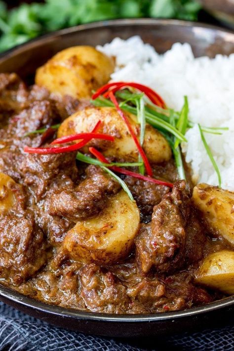 Slow Cooked Beef Massaman Curry - Rich, fall-apart beef in a spicy homemade sauce with new potatoes. Perfect comfort food! Beef Massaman, Beef Massaman Curry, Massaman Curry, Recipe Beef, New Potatoes, Slow Cooked Beef, Slow Cooked Meals, Hearty Meal, Curry Dishes