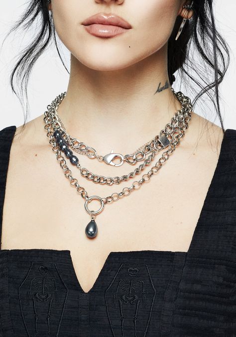 A grungy twist on a classic pearl necklace! This dimensional piece features rolo, curb, figaro & link chains in varying thicknesses for a tangle-free layered look without the fuss. Add a smattering of imitation grey pearls & a couple of ornamental clasps, and you have a quirky necklace for eclectic styling.   - COLOUR: Silver - COMPOSITION: Metal alloy - GEMSTONE: Imitation pearl  - CHAIN LENGTH: 35cm, 40cm, 45cm + 8cm extension chain - PENDANT: 4cm total drop Pearl Layered Necklace, Classic Pearl Necklace, Festival Accessories, Floral Skull, Pearl Grey, Layered Necklace, Brown Floral, Pearl Chain, Layered Look