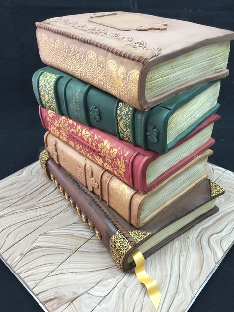 Vintage Books Cake Five chocolate cakes filled with ganache and stacked. Stenciled and handpainted. Stack Of Books Cake Ideas, Cakes Inspired By Books, Wedding Cake Book Theme, Books Birthday Cake, Stack Of Books Cake, Book Themed Cake, Book Wedding Cake, Spillian Wedding, Library Cake