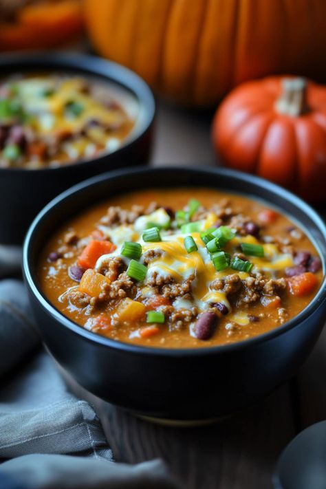 Warm up this fall with a bowl of flavorful pumpkin chili! Packed with spices, beans, and a cozy blend of veggies, it's a hearty dish everyone will love. Pumpkins Recipes, Fall Chili, Black Bean Chicken, Savory Pumpkin Recipes, Pumpkin Beer, Best Chili Recipe, Hearty Chili, Traditional Chili, Pumpkin Chili