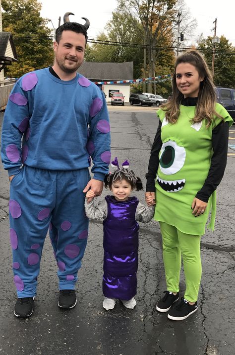 We did Monsters Inc this year! Sully, Mike Wazowski and Boo! Diy Sully Costume Men, Sully Diy Costume, Diy Sully Costume, Monsters Inc Maternity Costume, Boo And Sully Costume Couple, Monster Inc Costume Family Of 3, Diy Sully Costume Monsters Inc, Monster Inc Family Halloween Costumes, Monsters Inc Family Costume Pregnant