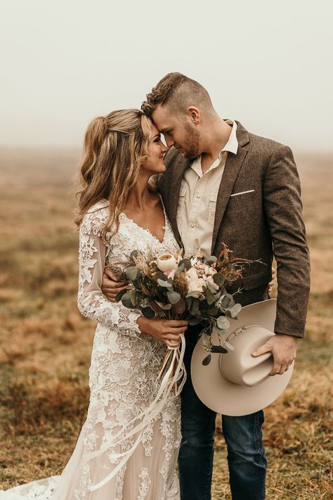 #goldenshutterco #winterelopement #arkansaselopement #arkansasphotographer #destinationelopement #ozarks #ozarkmountains #elopement #eloping #elopmenetphotographer #boho #earthytones #neutral #earthy #fog #foggywedding Boho Country Engagement Photos, Wedding Photos Boho, Country Elopement, Western Boho Elopement, Cowboy Wedding Photoshoot, Western Elopement Photoshoot, Western Wedding Photography, Western Wedding Portraits, Western Mountain Elopement