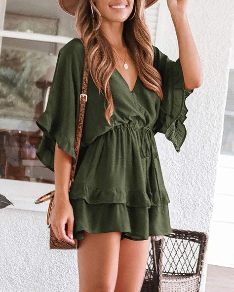 Jumper made of lightweight and soft solid fabric. It features deep v neckline, batwing sleeves with ruffle trim, elastic high waist, flared wide leg, back zipper.
The unique back zipper design makes it easy to wear. This adorable jumper is an essential to every spring and summer outfit. Green Romper Outfit, Short Jumpsuit Outfit, Olive Romper, Summer Romper Outfit, Hippie Mode, Olive Green Romper, Shorts Jumpsuit, Beach Rompers, Flowy Romper