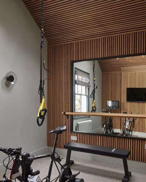 🥊 Couldn't get the punching bag in time for the photo shoot of this home-gym, but it now hangs in the right corner, next to the ballet… | Instagram Gym Makeover Ideas, Barre Home Gym, Home Gym Feature Wall, Home Gym With Punching Bag, Attic Home Gym, Home Gym Punching Bag, Slat Wall Gym, Closet Gym Ideas, Home Barre Studio