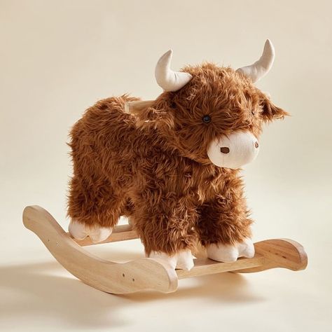 Little ones can take life by the horns while riding our cow plush rocker. Crafted with a huggable body, a whimsical face and long, lush fur, it features solid wood handles and precision-shaped runners for a smooth, secure and gentle rocking motion. DETAILS THAT MATTER Plush is made with soft-to-the-touch 100% polyester over iron frame. Runners are crafted of solid rubber wood. Wood handles provide steady grips. Filled with 100% polyester fibers. Eyes are made of ABS plastic. KEY PRODUCT POINTS Pottery Barn Kids exclusive. Recommended for Ages 12 months up to 5 years or up to 110 lbs. Spot clean. Imported. PERSONALIZATION DETAILS Personalization is available, for an additional cost. Personalization will be centered on one wooden glider rail. Wooden Animals Toys, Plush Nursery Rug, Boys Room Tractor Theme, Baby Boy Door Hanger For Hospital Western, Western Baby Gifts, Rustic Boho Nursery, Farmhouse Toddler Boy Room, Highland Cow Stool, Pink Cow Nursery