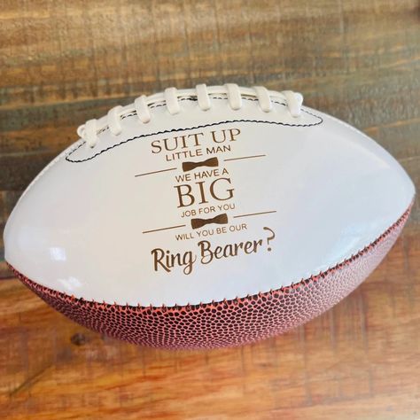 "FOR UNITED STATES FREE SHIPPING ORDERS OVER $35 AND 25% OFF STORE WIDE YEAR END SALE These Ring Bearer, Jr. Groomsman proposal footballs are a great way to ask the little guys to be on your team for that special day! The engraving comes out to a warm brown color with easy to read contrast. This is an \"engraved\" football and when engraved into the leather it is permanent and reveals the natural brown color. There is NO other color option available. The engraving will last forever and will not Ring Bearer Proposal, Ring Bearer Gift, Year End Sale, Junior Groomsmen, Ring Bearer Flower Girl, Groomsmen Proposal Gifts, Groomsman Proposal, Ring Bear, Ring Bearer Gifts