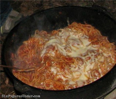 Spaghetti made in a Dutch oven over the campfire is way better than any spaghetti you'll eat at home Campfire Spaghetti, Camping Spaghetti, Campfire Recipes, Hacks To Save Money, Eat At Home, Dutch Oven Cooking, Frugal Family, Campfire Food, Oven Cooking