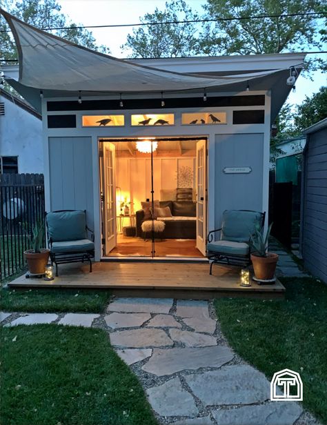 The coziest backyard studio! This charming outdoor entertaining space is perfect for enjoying a summer evening or hosting a backyard barbecue. A studio like this one is a great place to start when adding value and living space to your backyard. Create a She Shed escape, an inviting pub shed, a decked out man cave, or even a modern home office. With a Tuff Shed studio the possibilities are endless.  Bring your style to the interior design and you'll have a great place to relax in your backyard. Shed Next To House Ideas, Tuff Shed Conversion, Shed Entertaining Space, Cool Sheds Ideas, Shed Porch Ideas, Outdoor Office Shed, Detached Office, Sheds Ideas Backyard, Shed Studio