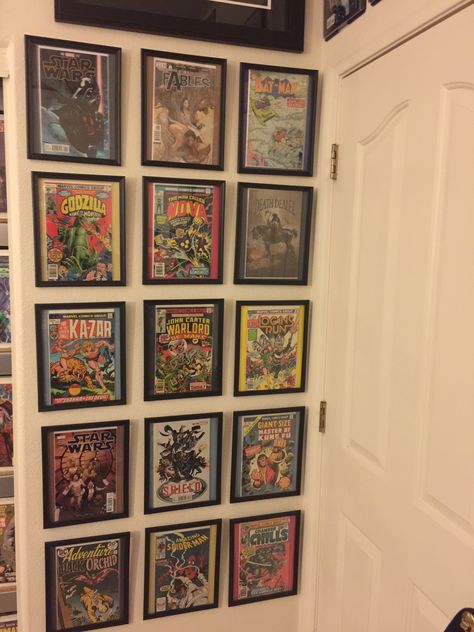 This is an inexpensive way to display comics. Dollar frames, colored construction paper and Voila! Feel free to repeat as needed! Diy Comic Book Display, How To Display Comic Books, Comic Book Gallery Wall, Comic Book Wall Decor, Comic Book Frame Ideas, Comics On Wall, Display Comic Books, Marvel Display, Comic Book Room Decor