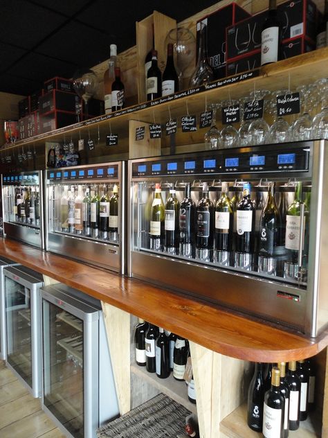 Wine Machine, Self Pour Wine Bar, Wine Tap, Built In Wine Dispenser, Coffee And Wine Bar Business Ideas, Wine Bar Bottle Shop, Modern Wine Bar Restaurant, Wine Shelf Restaurant, Wine Shop Interior Design Liquor Store