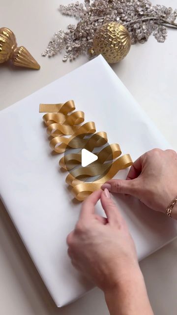 Jordyn Smith on Instagram: "Holiday wrapping idea! Comment YES PLEASE for links to shop. 

A fun,  creative way to wrap your presents this year. I may be doing every present 🎁 like this! Make sure to grab the double sided tape, and a pretty ribbon! I've linked them for you XO! 

How to shop: 
•Comment YES PLEASE and I'll send you over a link! 
•Make sure you're following me @ourpnw_home to receive the link in DMs! 
•OR Click link in my bio! 
#wrapping #holiday #christmastime" Elegant Christmas Gift Wrapping Ideas, How To Decorate Christmas Presents Wrapping Ideas, Tying Ribbon Around Boxes, Scarf Wrapping Ideas, Luxury Gift Wrapping Ideas, Different Ways To Wrap Christmas Gifts, Ways To Wrap A Gift Card, Present Ribbon Ideas, Tying Ribbon On Gift