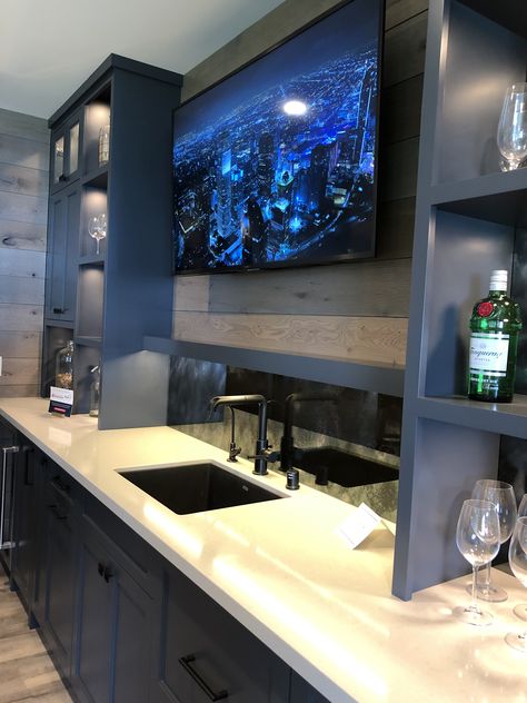 Idea for basement bar - minus the TV. More structure of shelving/cabinets than color necessarily. Could see a cool granite backsplash Basement Wet Bar, Building A Home Bar, Basement Bar Plans, Bloxburg Basement, Home Wet Bar, Dream Basement, Cave Basement, Home Bar Rooms, Modern Home Bar