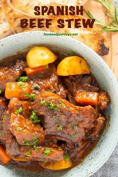 Deliciously rich sauce and fall-off-the-bone short ribs! Grab some bread and enjoy Spanish Beef Stew -- a glass of red wine won’t hurt either! Spanish | Recipes | Stew Recipe | Beef Recipe | Braised Beef. #shortribsstew #beefrecipes Spanish Beef Stew, Spanish Stew, Easy Beef Stew, Glass Of Red Wine, Recipe Beef, Spanish Recipes, Spanish Dishes, Beef Stew Recipe, Beef Recipe