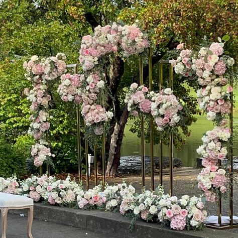 Backdrop and Arch for behind your Sofreh and/or ceremony. With this Arch, we tried to add a lot of great addition to the view behind the ceremony but not covering the beautiful lake either! 💎💎💎💎. . This arch is easy to move after the ceremony behind the head table as well. In our consultations we always go through details of what are the items that we can use at both ceremony set up and move to reception as well. Always using Fresh Flowers for our designs. Outdoor Nikkah Ceremony, Nikkah Separation Decor, Anand Karaj Decor Outdoor Weddings, Persian Sofreh Aghd, Persian Weddings Sofreh Aghd, Head Table, Beautiful Lakes, The Head, The View