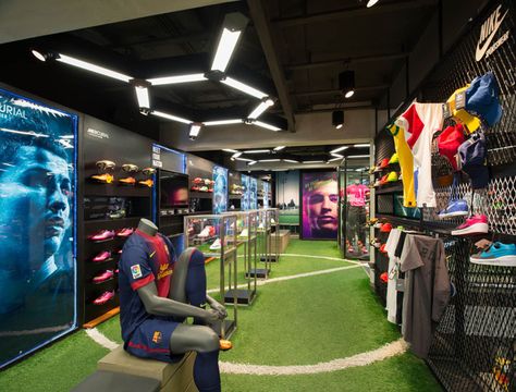 Ari Football flagship store Whitespace Bangkok 03 Football Store Display, Football Display Ideas, Sports Training Facility, Sport Bar Design, Football Displays, Batting Cage, Diy Living Room, Soccer Store, Football Shop