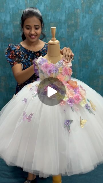 Sowmiya Duraisamy on Instagram: "One of our top best seller now 😍

We created this Gorgeous floral theme ball gown with hand crafted butterfly 🦋 from #sowmyzcouture

Colours and size can be customised 

Dm for details 

#sowmyzcouture #firstbirthdaydress #cute #babygirl #momanddaughter #love #boutique #coimbatore #ballgown #chennai #momanddaughterdress #couturefashion #onlineboutique #usa #australia #butterflytheme #fashioninsta #kidsdress #trendydress #princess #ballgown #floralgown #momblogger #rosegown #princessgown #panelgown #whitegowns" Princess Ballgown, Rose Gown, Princess Gown, Butterfly Theme, Floral Gown, White Gowns, Floral Theme, Coimbatore, Mom Blogger