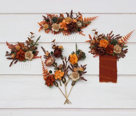 Embrace the warm hues of autumn with our terracotta wedding accessories 🍂✨ Featuring handcrafted hair combs and boutonnieres adorned with rich oranges, earthy browns, and delicate florals, perfect for an elegant fall wedding. These pieces bring the beauty of the season to life! 🍁🌾 #fallwedding #terracottaflowers #burntorangewedding #WeddingAccessories #pocketboutonniere #bridalhairstyle #flowerhaircomb Pocket Boutonniere, Groom Groomsmen, Fall Wedding Flowers, Handmade Flowers Paper, Flower Hair Comb, Elegant Fall, Hair Combs, Rust Orange, Flower Accessories