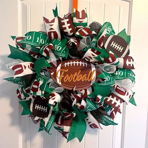 It’s Football Season!!! Show Ur Neighbors How Much You Like Football. Front Door Football Wreath Made With Mesh And Football Themed Ribbon. It’s Nice And Full. Measures About 22 Inches Across. Football Wreaths For Front Door, Football Wreath Diy, Football Wreaths, Sports Wreaths, Football Wreath, Scentsy Bars, Seasonal Wreaths, West Highland Terrier, Girls Handmade