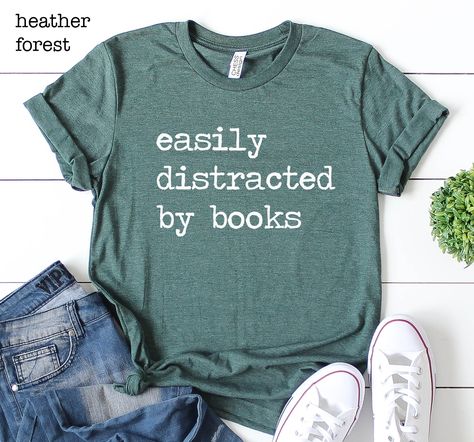 Easily Distracted By Books Shirt, Book Lover Shirt, Librarian Shirt, Gift For Bookworms, Readers Shirt, Funny Teacher Shirt. Reading Shirt Please Check All Photos for Details This listing is for 1 (one) shirt only, to buy more than 1 item please add each shirt to cart separately. --- SIZE AND MATERIAL --- * UNISEX CREW NECK T-SHIRTS: Most customers find unisex shirts true to size. Relaxed fit for ladies and they can order one size smaller for a further slim fit. Unisex crew neck shirts run a tou Funny Librarian Shirts, Book Tee Shirts, Book Shirts Funny, Bookish Shirts, Library Shirt, Book Nerd Shirts, Books Shirt, Librarian Shirt, Cute Shirt Designs