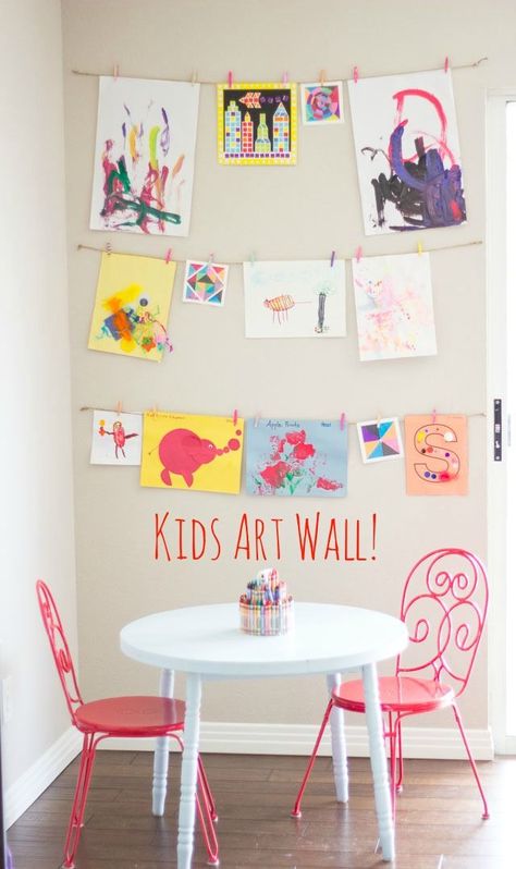 Creating a kids' art wall. This would be so adorable in a kids play room. Corner area where they can draw and painting all day. Then display their work for all to see. #kidsartdisplay #creativekids #kidsart Display Kids Artwork In Bedroom, Playroom Artwork Display, Diy Art Display Kids, Kids Playroom Artwork, Kid Artwork Display, Display For Kids Artwork, Kid Art Wall Display, Hanging Kids Art On The Wall, Preschool Wall Displays