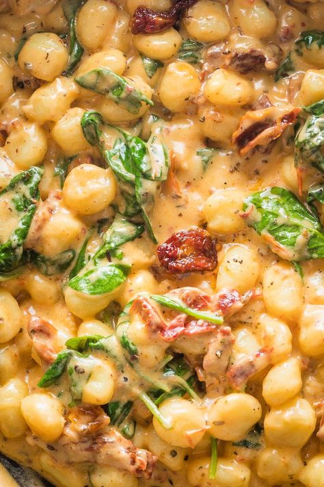 Try this recipe for a Tuscan-inspired gnocchi in cream sauce when you need an easy but full-flavored meal. It's got pillowy gnocchi, tender spinach, tangy sun-dried tomatoes, butter, and garlic. And you'll love that it's all made in one pan in about 15 minutes! Tuscan Gnocchi, Cream Sauce With Spinach, Sausage Skillet Recipe, Gnocchi Recipes Easy, Spinach Tortellini, Easy Skillet Meals, Chicken Gnocchi, Chicken Gnocchi Soup, Gnocchi Soup