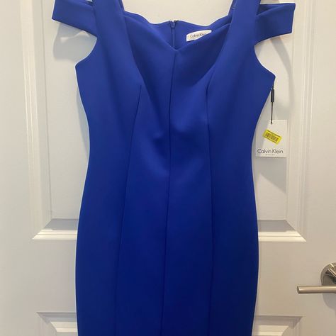 Never Been Worn. Calvin Klein Blue Dress. Size 8. Has Cutouts On The Sleeve And A V-Neckline. Tight-Fitted Dress. I Would Say Runs Small. Free People Adella Dress, White Knit Sweater Dress, Women Calvin Klein, Calvin Klein Blue Dress, Orange Bodycon Dress, Mustard Yellow Dresses, Tight Fitted Dresses, Boden Women, White Sundress