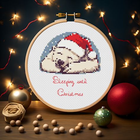 Sleeps until christmas. This cross stitch pattern is available in my esty shop for instant download. Follow the link. Polar Bear Cross Stitch, Bear Cross Stitch Pattern, Christmas Cross Stitch Patterns, Bear Cross Stitch, Sleeps Until Christmas, Cross Crafts, Cross Stitch Finishing, Cross Stitch Patterns Christmas, Christmas Decorations Ornaments