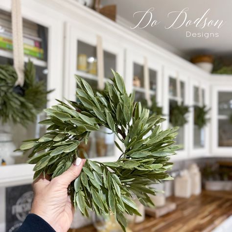 How To Hang Wreaths On Kitchen Cabinets Pantry Door Wreath Ideas, Hanging Small Wreaths On Cabinets, Kitchen Hood Wreath, Plants On Kitchen Cabinets, Christmas Wreath On Cabinet Door, Kitchen Cabinet Wreath, Wreath On Range Hood, Wreaths On Kitchen Cabinet Doors, Christmas Bows On Cabinets