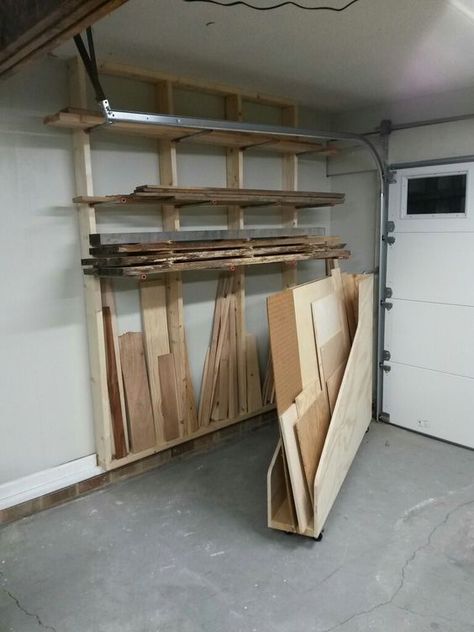 Lumber storage area. Horizontal storage for longer pieces, and a plywood rack that swings out to reveal vertical storage for shorter pieces. Small Garage Organization, Work Garage, Diy Projects Garage, Garage Organization Systems, Garage Organization Ideas, Garage Organization Tips, Work Tables, Lumber Storage, Garage Organization Diy