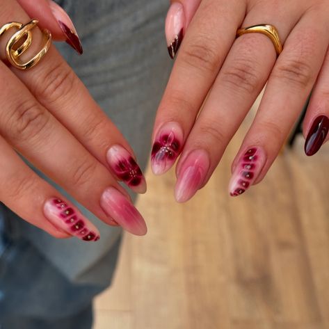 it girl nails 🐆 deep cherry mix and match nails for aleena. always grab an outfit shot on her way out because i trust she’s planned the nails to coordinate lol I keep saying this, but definitely my favourite set I’ve ever done (so far? lmao) builder gel nails + one extension ☝🏻 this combo of aura, flowers, blooming gel, french + glitter was absolutely lovely to create and although I went a bit non verbal while working out the steps I’m absolutely in love with it 🤣 i’m cait, a colchester ... Builder Gel Nails Almond, Bloom Nails Art, Blooming Gel Aura Nails, Fall Blooming Gel Nails, Nails With Blooming Gel, Blooming Gel Designs, It Girl Nails, Mix And Match Nails, Blooming Gel Nail Art