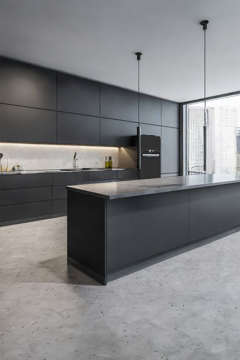 Black Kitchen Concrete Floor, Black And Concrete Kitchen, Modern Kitchen Concrete Floor, Kitchen Soft Aesthetic, Kitchens With Concrete Floors, Dark Minimalist Kitchen, Dark Island Countertop, Backlit Shelving, Christmas Guest Bathroom