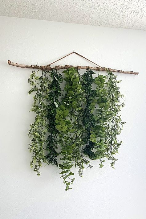 Massage Room With Plants, Hanging Ivy Wall, Fake Plant Wall Bedroom, Diy Faux Plant Wall, How To Hang Vines On Walls, Hanging Greenery Wall Decor, Green Wall Diy, Diy Vine Wall, Fake Greenery Wall