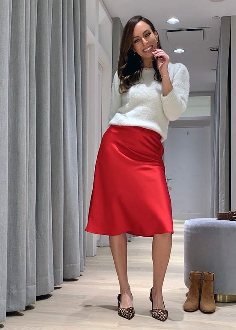 How to wear a red satin skirt with a white sweater and leopard shoes #redskirt #skirts #satin #slipskirt #outfitideas #holidaystyle #holidayoutfits @sydnesummer Red Satin Midi Skirt, Red Silk Skirt Outfit Winter, Red Satin Skirt Outfit Winter, How To Wear A Satin Skirt, Red Slip Skirt Outfit, Red Skirt Christmas Outfit, Red Silk Skirt Outfit, Red Skirt Outfit Ideas, Red Satin Skirt Outfit