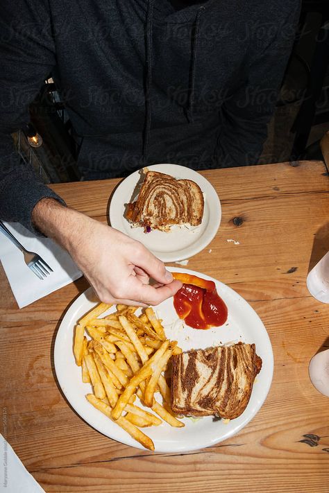 Dipping french fry in ketchup while eating food at restaurant. Direct flash UGC Fast Food Restaurant Photoshoot, Fries Photoshoot, Fast Food Restaurant Photography, Fast Food Fashion Photography, Food Flash Photography, Churros Branding, Food In Restaurant, Flash Food Photography, Food At Restaurant