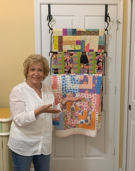 If you read our blog post about displaying quilts (page.fo/thimblesdisplayquilts), you know we're ALWAYS looking for fun new ways to show off our quilts at home. @thequiltkeeper is a new favorite! The hanger fits over the back of a door and you can hang even more quilts with the add-on cascade set. How many doors do you have in your house that need quilts?? page.fo/quiltkeeper Quilt Shadow Box Display, How To Display Quilts In Your Home, Quilt Display Case, Quilt Display Racks, Quilt Wall Hangers, Quilt Racks, Quilt Hanging, Quilt Hangers, The Cascades