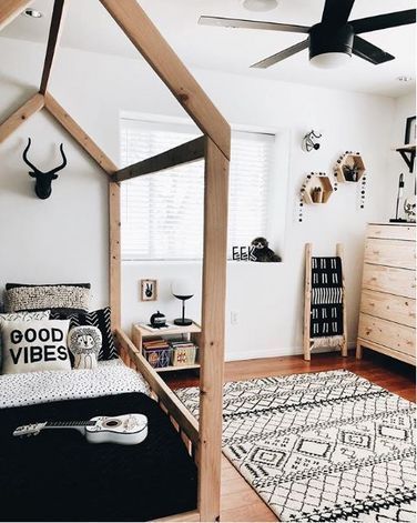 modern boho boy room with rustic wood bed and music theme boys room ideas, boy bedroom decor, boy bedroom design, boy bedroom furniture, boy room artwork ideas Home Interior Layout, Best Boys, Toddler Boy Room Decor, Decor Images, Big Boy Bedrooms, Interior Layout, Boy Bedroom Design, Toddler Boys Room, Toddler Rooms