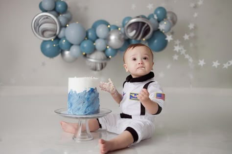 First Trip Around The Sun - First Birthday  cake smash   #boycakesmash #cakesmash #firstbirthday #firstbday #bdaythemesboys #astronautbday #astronaut #balloongarland #bluesilver #couturecupcakery #bluecake #ombrecake #tuftexballoons #silverstars Space Smash Cake Photos, First Round Around The Sun Birthday, First Trip Around The Sun Photoshoot, First Trip Around The Sun Backdrop, Space Smash Cake 1st Birthdays, First Trip Around The Sun Cake Smash, First Trip Around The Sun Birthday Party Cake, Space Cake Smash, Space First Birthday