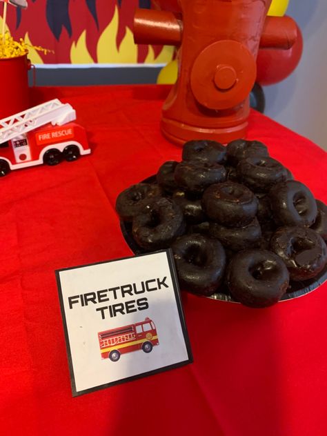 #candytable #candy #donuts #donuttires #birthday #firetruck #firetruckbirthday Firefighter Snacks, Firetruck Party Ideas, Firefighter First Birthday, Firefighter Desserts, Firetruck Gender Reveal Ideas, Fire Truck Gender Reveal Ideas, Firetruck 4th Birthday Party, Fire Truck Party Food, Firefighter Candy Table