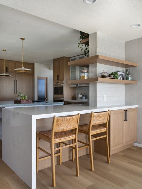 Wellness Inspired Kitchen — M. Swabb Kitchen With No Dining Area, Elevated Kitchen Floor, Kitchen Bar Seating Ideas, Half Wall Island Kitchen, Wrap Around Counter In Kitchen, Kitchen At Entrance Of Home, Kitchen Peninsula Storage, Single Side Kitchen, Modern Kitchen Peninsula