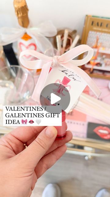 Shelby | Gift-in-a-Box Guide on Instagram: "Coquette Valentine’s Gift Idea 🎀👄 This makes the cutest valentines/ galentines gift for the girlies! Lip balms are so trendy right now so here’s a cute way to turn them into a gift 🎁 I love gifting “elevated necessities” and with the weather how it’s been recently… a nice lip balm is definitely a necessity! Comment BALM for everything I used to put this valentines gift together! Inspo from @aurelie.erikson #valentinesdaygift #valentinesdaygiftideas #happyvalentinesday #valentinesday2024 #coquette #valentinesvibes #laneige #reelsinsta #amazonfinds #vdaygifts #amazongifts #coquettebows #bowtrend #bows #amazon" Lana Del Rey Valentine Cards, Coquette Valentines Day, Coquette Valentines Day Card, Cheap Heart-shaped Huggie Earrings For Valentine's Day, Gold Tarnish-resistant Huggie Earrings For Valentine's Day, Vday Gifts, Galentines Gifts, Nice Lips, Amazon Gifts