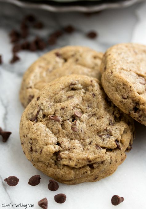 Cafe Mocha Cookies. Made with butter, dark brown sugar, sugar, eggs, vanilla, all-purpose flour, bread flour, cornstarch, baking soda, salt, coffee grounds, and mini chocolate chips. Mocha Cookies, Cafe Mocha, Cookie Table, Table For Two, Café Mocha, White Chocolate Chip Cookies, Coffee Dessert, Food And Travel, Tea Cakes