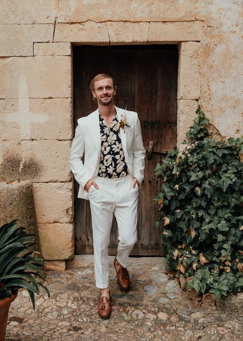 This Modern Romantic Mallorca Estate Wedding Inspiration is a Luxe Boho Dream | Junebug Weddings Modern Wedding Attire For Men, Boho Chic Wedding Outfit Guest Men, Boho Wedding Outfit Guest Men, Funky Wedding Suits Men, Hawaiian Shirt Wedding Men, Tropical Formal Wedding Attire Men, Hawaiian Wedding Mens Attire, Tropical Mens Fashion, Men’s Destination Wedding Outfit