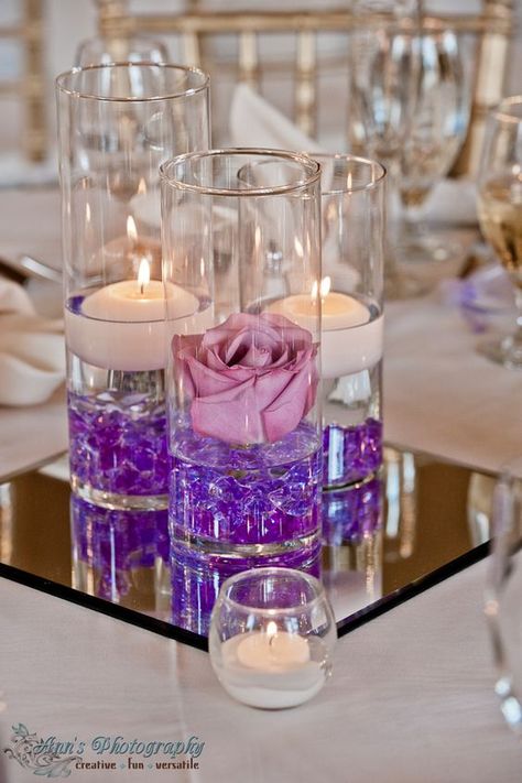 Purple Floating Candle Wedding Centerpiece / http://www.himisspuff.com/purple-wedding-ideas/13/ Quinceanera Decorations, Vase Centerpieces, Wedding Table Centerpieces, Floating Candles, Cheap Wedding, Purple Wedding, Decoration Table, Quinceanera, Table Centerpieces