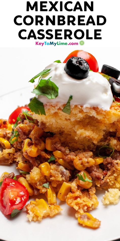 Your family will love this quick and easy Mexican Cornbread Casserole recipe made with Jiffy mix! This loaded ground beef casserole has tons of flavor from the homemade taco seasoning, RO-TEL, corn, cheddar cheese, and all the taco toppings. #MexicanCornbread #JiffyCornbread #JiffyCornbreadRecipe #CornbreadCasserole #MexicanCornbreadCasserole #GroundBeefCasserole KeyToMyLime.com Mexican Cornbread Jiffy, Hamburger Meat Dishes, Taco Cornbread Casserole, Easy Mexican Cornbread, Mexican Cornbread Casserole Recipe, Mexican Cornbread Casserole, Casserole With Ground Beef, Jiffy Cornbread Recipes, Turkey Meals