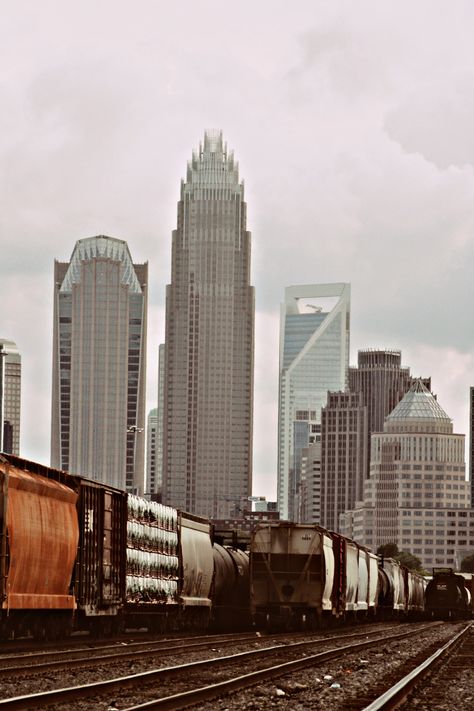 City photography. Charlotte skyline. Train track photography. Charlotte Nc Skyline, Track Photography, Train Tracks Photography, Charlotte Skyline, Charlotte City, Oil Painting Inspiration, Collage Drawing, Screen Saver, Poster Ideas