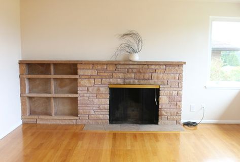 Fireplace Before - The Inspired Room Painted Stone Fireplace Makeover, Asymmetrical Fireplaces, Off Center Fireplace, Painted Stone Fireplace, Grey Stone Fireplace, Stone Fireplace Makeover, Sandstone Fireplace, Small Guest Room, Brick Hearth