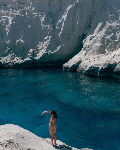 girl dancing in the beach in volcanic cliffs canyon with blue waters in milos island greece Greek Summer Aesthetic, Aesthetic Turquoise, Greece Milos, Greece Aesthetics, Turquoise Aesthetic, Greece Aesthetic, Mediterranean Aesthetic, Milos Greece, Greek Summer