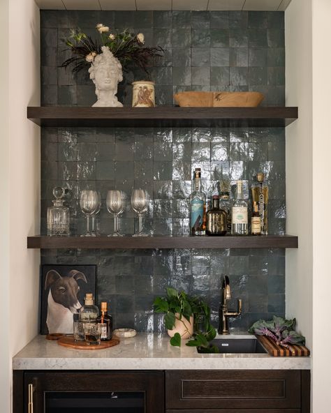 This perfectly styled bar is everything, and I’m sharing all the details on my favorite pieces. From the hand painted bust pot to the stunning polished gold faucet, I’ve handpicked each item to bring that extra bit of luxe to your space. Want to add a Christine Vroom touch to your home? Comment "STYLE" below, and I’ll send you the links to shop my must-have pieces. #christinevroominteriors #southbayinteriordesign #losangelesinteriordesign #designinspiration #interiorstylingtips Built In Bar Styling, Wet Bar Styling, Wet Bar In Dining Room, Bar Shelf Styling, Bar Shelf Decor, Bar In Dining Room, Gold Faucet, Los Angeles Interior Design, Bar Shelf