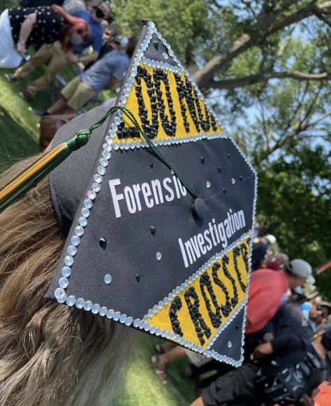 BGSU grads’ decorated cap that says “Forensic Investigation” and has a bedazzled border with yellow caution lines that are also bedazzled. Forensics Grad Cap, Forensic Chemistry Graduation Cap, Forensic Grad Cap, The Flash Graduation Cap, Criminology Graduation Cap, Grad Cap Ideas Criminology, Forensic Science Graduation Cap, Forensics Graduation Cap, Forensic Psychology Grad Cap